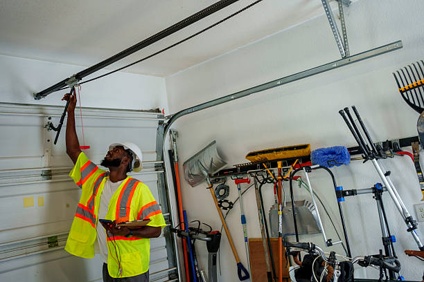 Professional Garage Door Panel Replacement technician working in Mountain Green, UT